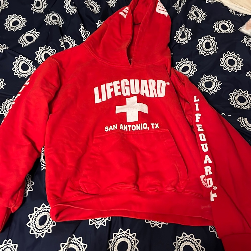 red life guard pull over